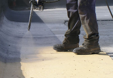 Coating systems over Aurora spray foam roof systems