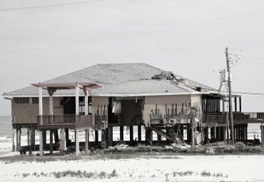 Wind damage - spray foam can help prevent uplift to Aurora roofs